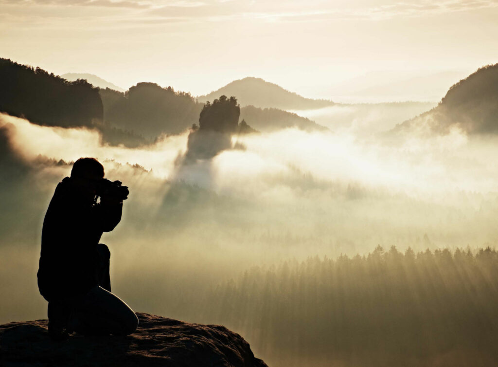 photographe dans la brume